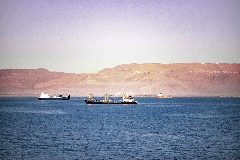 Iran claims two oil tankers caught fire after mine strikes in Strait of Hormuz