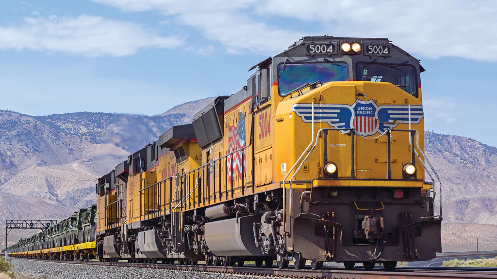 Union Pacific freight train transporting military equipment for a U.S. Army training operation